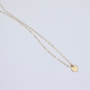 14k Gold Tiny Coin Necklace. Gold coin necklace. Layered necklace.