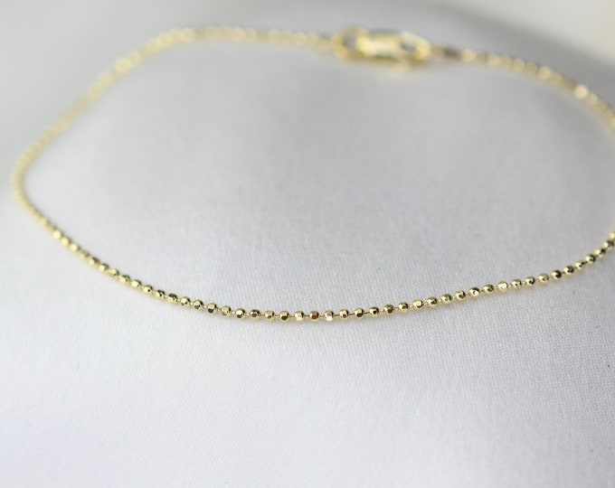 14K Gold Diamond Cut Bead Chain Bracelet. 14K Yellow Gold 1.1mm Diamond Cut Bead Chain Bracelet