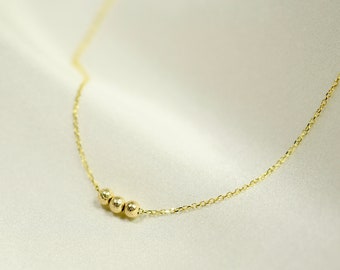 14K Gold Stardust Beads Necklace. 14K gold delicate necklace.