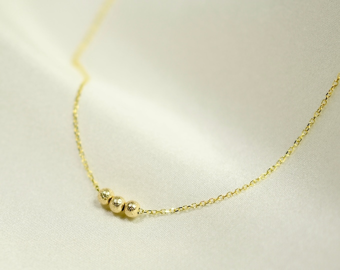 14K Gold tiny stardust beads necklace. 14K gold delicate necklace.