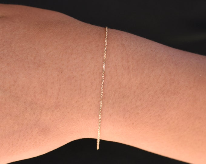 14K Gold Delicate Sparkle Bracelet. 14K Gold 1mm Diamond Cut Cable Chain Bracelet