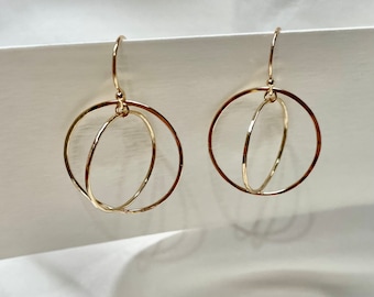 14K gold circle hoop earrings. 14K yellow gold circle earrings.