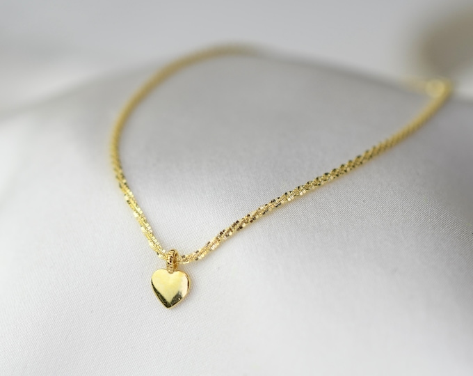14K Gold Sparkle Chain Heart Bracelet. 14K Yellow Gold 1.2mm Sparkle Chain Bracelet with Tiny Heart Charm