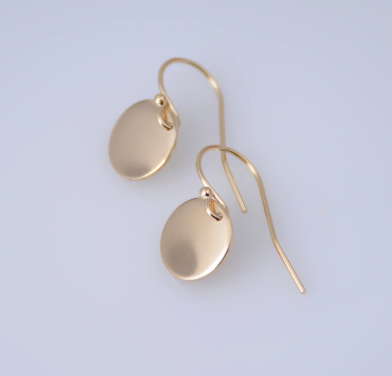 14K solid gold earrings. 14K solid gold tiny disc earrings. Tiny gold disc earrings. Simple earrings. Dainty earrings. Gift for her. image 4