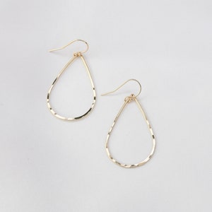 14K Teardrop Hoop Earrings - 14k gold Long Dangle Teardrop Earrings. 14K yellow gold teardrop earrings.
