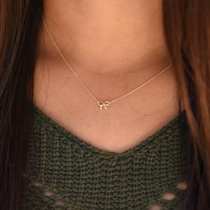 14K Gold Bow Necklace. 14K gold petite bow necklace. 14K Gold Adjustable Necklace