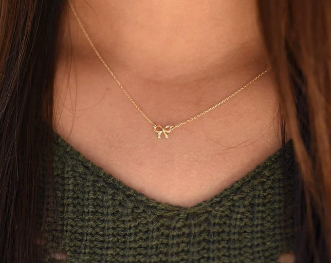 14K Gold Bow Necklace. 14K gold petite bow necklace. 14K Gold Adjustable Necklace