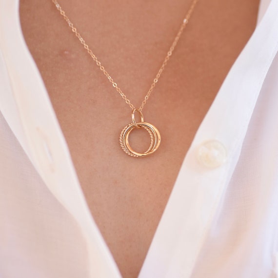 Linked ring necklace discount