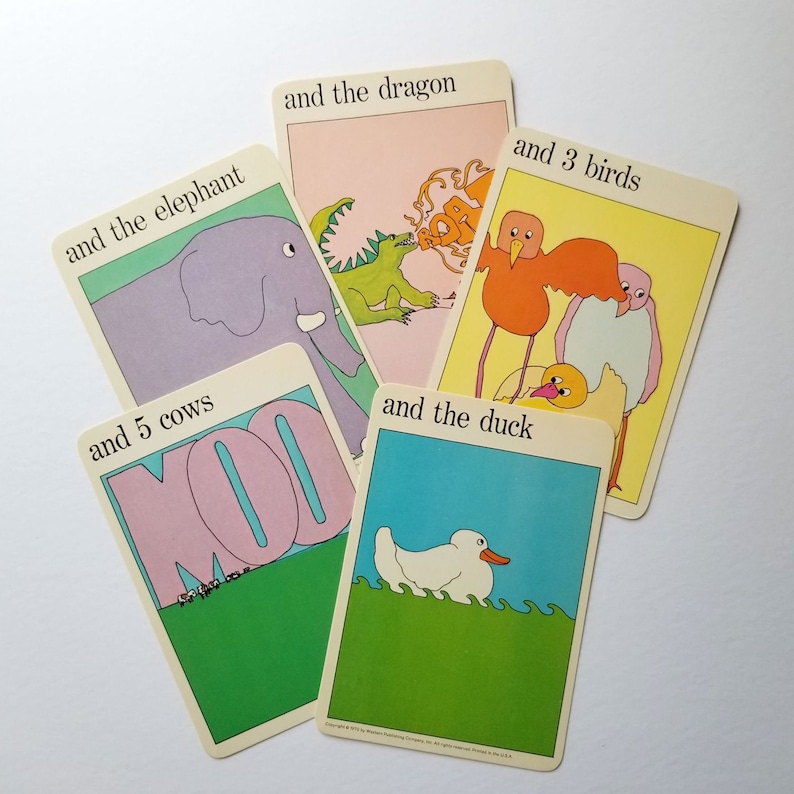 Vintage MoMA Animals & Numbers Flash Cards sold individually. Colorful double sided Cards with Illustrations & Black & White Typography on both sides.