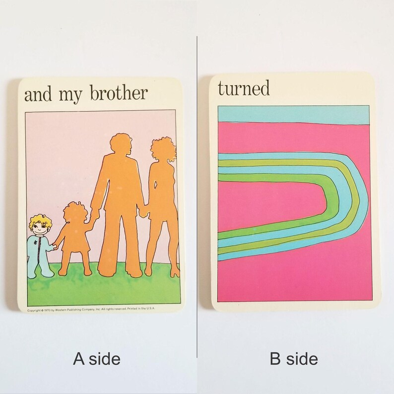 an image showing both sides of the same rectangular card. Side A has an illustration of a family in silhouette with only the boy in full detail and the text 'and my brother' at the top. Side B has an illustration of a colourful striped arc on a pink background and the text 'turned' at the top.