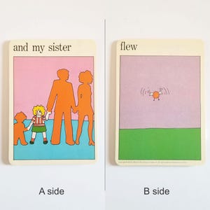 an image showing both sides of the same rectangular card. Side A has an illustration of a family in silhouette with only the girl in full detail and the text 'and my sister' at the top. Side B has an illustration of a bid flying away on a lilac sky background and the text 'flew' at the top.