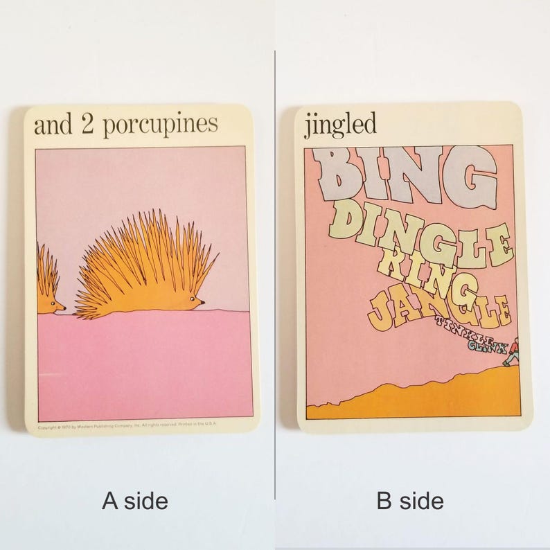 an image showing both sides of the same rectangular card. Side A has an illustration of 2 orange porcupines on a pink background and the text 'and 2 porcupines' at the top. Side B has an illustration of the words Bing Dingle Ring Jangle Tinkle Clink on a pink background and the text 'jingled' at the top.