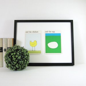 Two cards from the same series shown in a black frame for styling ideas. The frame is not included.