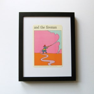 A card from the same series shown in a black frame for styling ideas. The frame is not included.