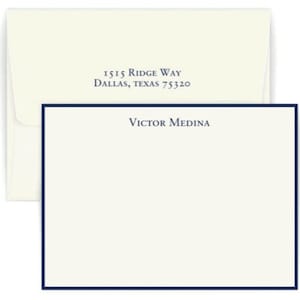 May include: A white card with a dark blue border. The card has the text "Victor Medina" printed in dark blue ink. The address "1515 Ridge Way, Dallas, Texas 75320" is printed on the envelope.