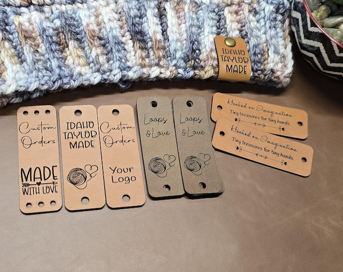 Featured listing image: Custom .85" x 2.50" Faux Leather Tag | Crochet  or Knit Hat Fold Over Tag |  PERSONALIZE! Logo Labels | Baskets, Blanket, Dog Bandana, Tags