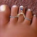 Attached star toe rings exclusive rhinestone one size 