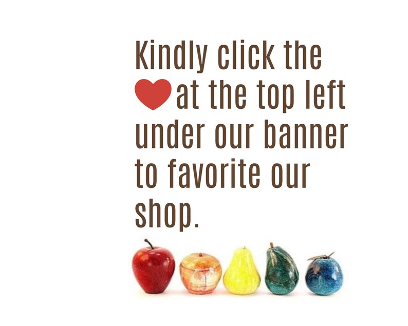 May include: The image features a row of decorative fruit sculptures in various colors, including red, yellow, green, and blue. Text above the fruit reads, "Kindly click the heart at the top left under our banner to favorite our shop."