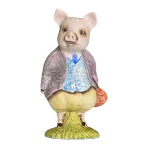 May include: A ceramic figurine of a pig dressed in a gray jacket, blue vest, and yellow pants, holding a red bag. The pig stands on a patch of green grass, with a detailed and whimsical design.