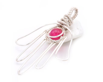 Hamsa hand pendant; wire wrapped pink semi precious stone; symbolism; colours of your chakra