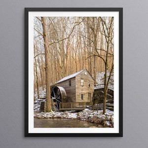 May include: A rustic wooden watermill with a large water wheel, nestled in a snowy forest. The mill has a wooden roof and windows, and is surrounded by bare trees. The scene is peaceful and serene, with a small stream flowing in front of the mill.