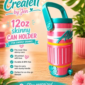 May include: A pink and white 12oz skinny can holder with a teal handle and accents. The text "Createlt by Jen" and "12oz skinny CAN HOLDER" are displayed. The can holder is designed for energy drinks and is 3D printed.