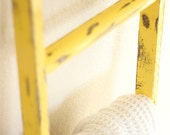 Yellow vintage ladder