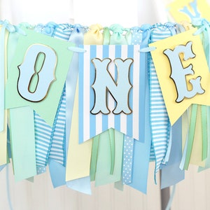 Carnival Circus High Chair Birthday Banner | ONE Banner and Optional Ribbon Garland | Light Blues, Mint, Pastel Yellow and Metallic Gold