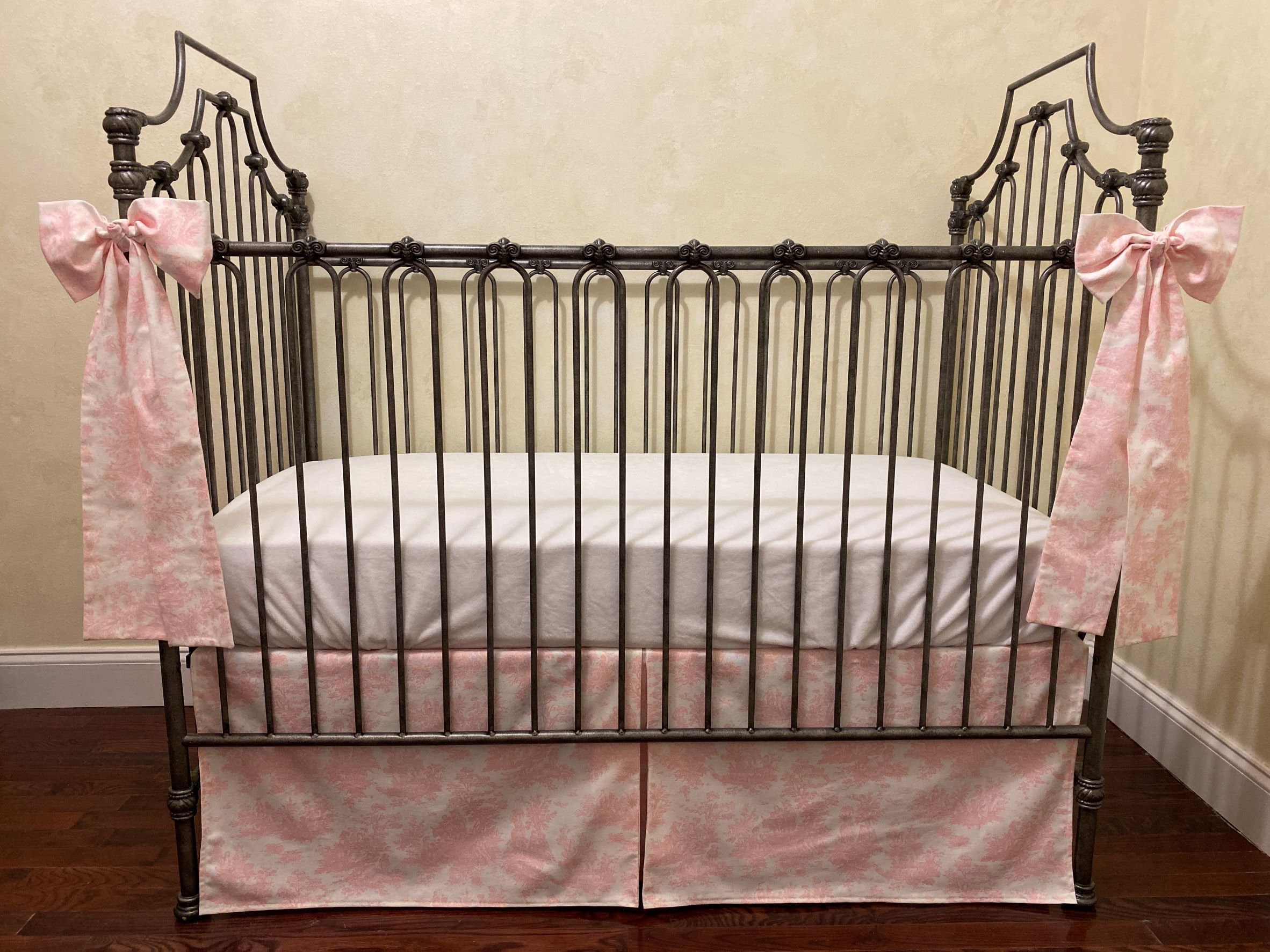 Pink plaid crib skirt top