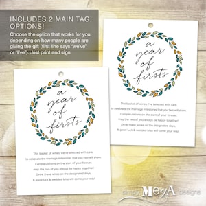 May include: A printable gift tag with a wreath design and the text "a year of firsts". The tag includes a message about celebrating a couple's first year of marriage with a basket of wine.