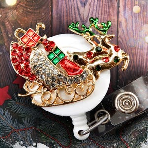 Porta credencial navideño retráctil con forma de trineo de renos y diamantes de imitación para enfermeras o personal de oficina
