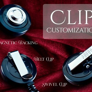 a variety of clip customization options, including magnetic backing, belt clip, swivel clip, and belt clip, all displayed on a red fabric background.