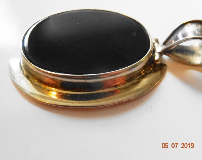 silver and onyx pendant