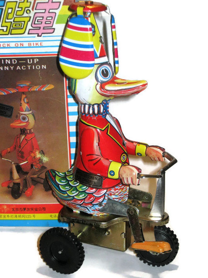 Vintage Reproduction Tin Toy Duck on Bike Wind Up China Metal Etsy