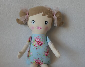 Cloth rag doll, beautiful blue floral fabric, bows in her hair