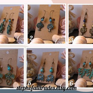 May include: Six pairs of handcrafted earrings with sea-themed charms. Designs include seahorses, trees, octopuses, crabs, and leaves, with turquoise beads. The earrings are displayed on brown cards, with the Etsy shop name visible.