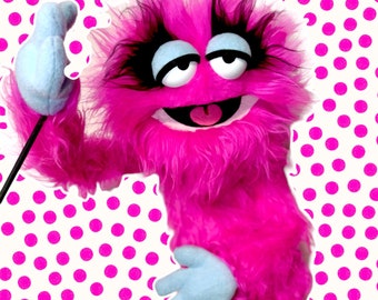 Sr.  Rosita the peaceful monster ,  Enjoyable pink monster puppet wooden rods