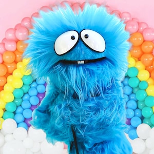 Marioneta de mano de monstruo azul Karturillo, telefoon, uso profesional