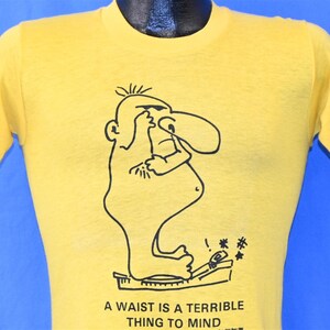 80s Goofy A Waist is a Terrible Thing to Mind Graphic Cartoon t-shirt Small