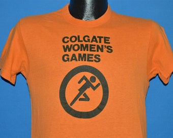 70er Jahre Colgate Damen Spiele T-Shirt Klein