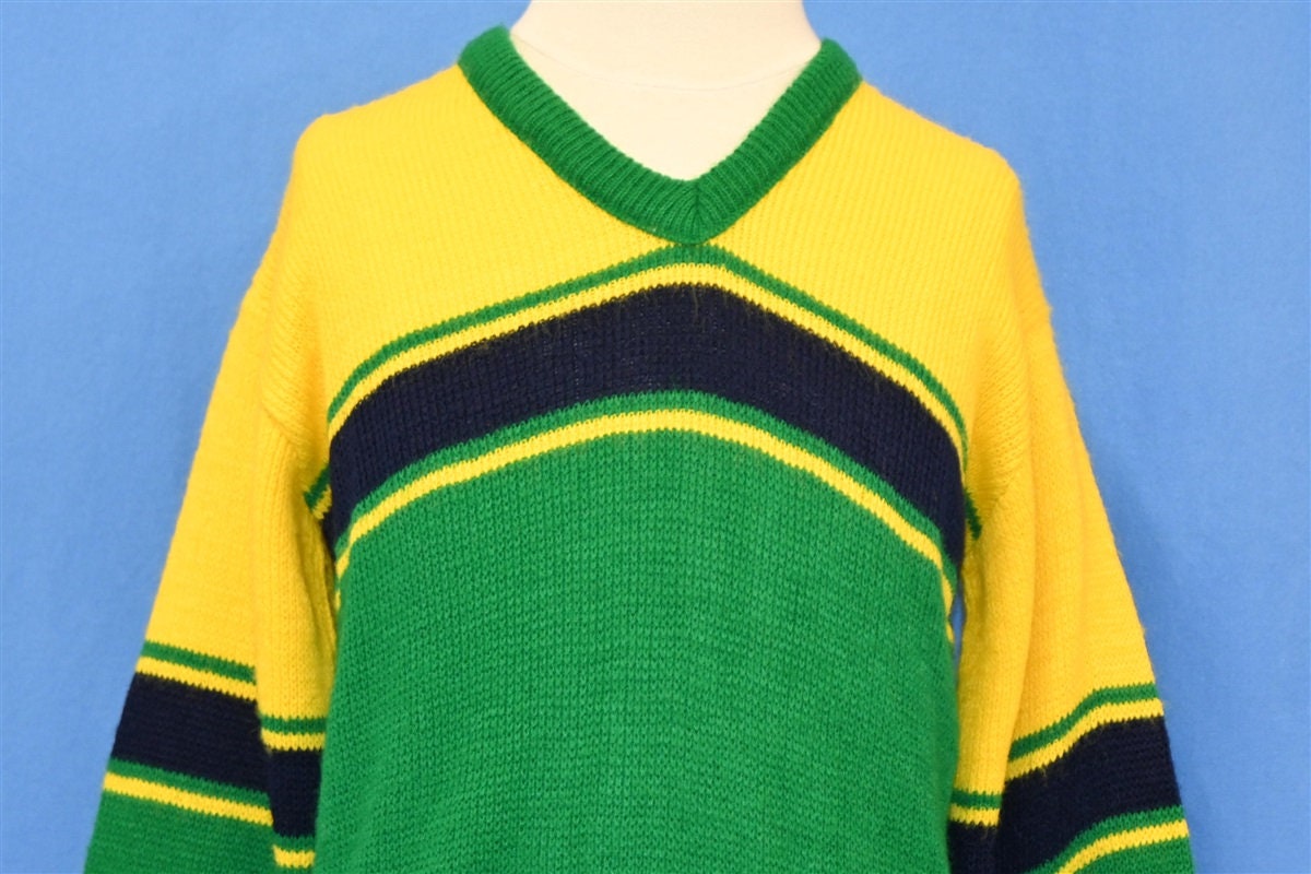 Green and top yellow striped sweater