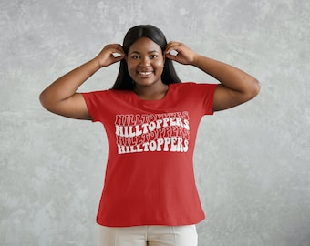 May include: A red t-shirt with a white graphic that says "HILLTOPPERS" repeated four times in a retro font.