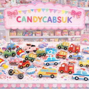 May include: A collection of colorful toy vehicles, including cars, trucks, and fire engines, are displayed on a table. The sign above reads "CANDYCABSUK". The scene is set in a candy-themed shop with a gumball machine and shelves of sweets.