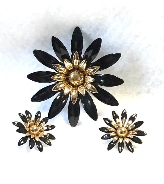 Black Enamel Flower Brooch and Earrings signed Sar