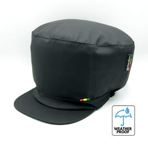 May include: Black waterproof cap with a red, yellow, and green stripe on the brim and a small "Hatayfoya" logo on the side. The cap is labeled "Weather Proof".