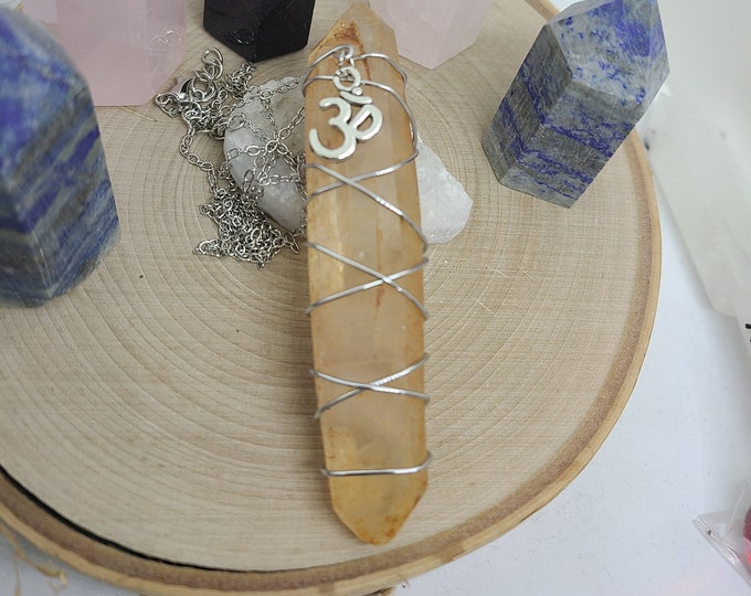 Featured listing image: Lemurian Crystal Necklace, Lemurian Quartz Pendant Necklace, Lemurian OM Necklace, Lemurian Quartz Pendulum Necklace, Raw Crystal Necklace
