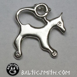 9th century silver Liv & Latgallian horse/leucrota pendant from Viking Age Latvia