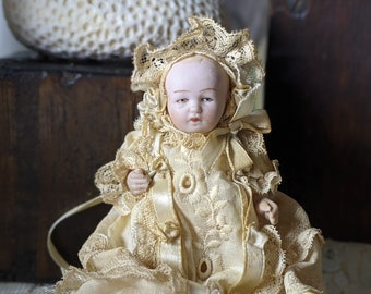 small porcelain baby dolls