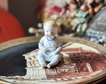 Antique porcelain baby doll figurine German sitting miniature
