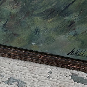 Peut inclure: Une peinture &agrave; l'huile encadr&eacute;e repr&eacute;sentant une sc&egrave;ne de paysage vert. La peinture est sign&eacute;e "Michael" en bas &agrave; droite.